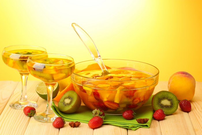 Fruit punch with strawberries, kiwi, and peaches
