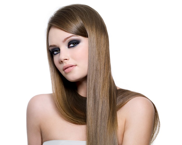 Brown haired woman with dark eye makeup