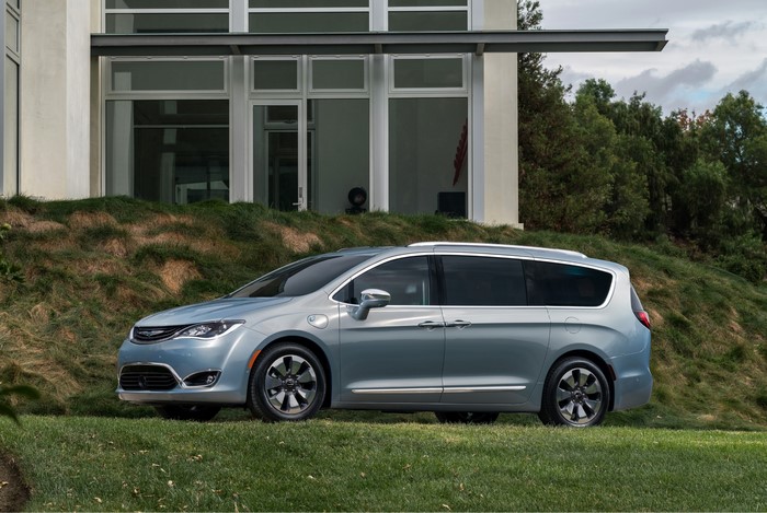 2017 Chrysler Pacifica Hybrid minivan parked on grass