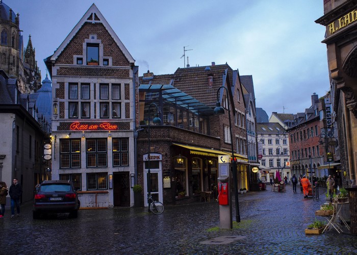 Street scene in Aachen, Germany at dusk