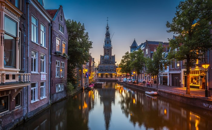 Alkmaar Canal with Historic Buildings and Tower at Dusk