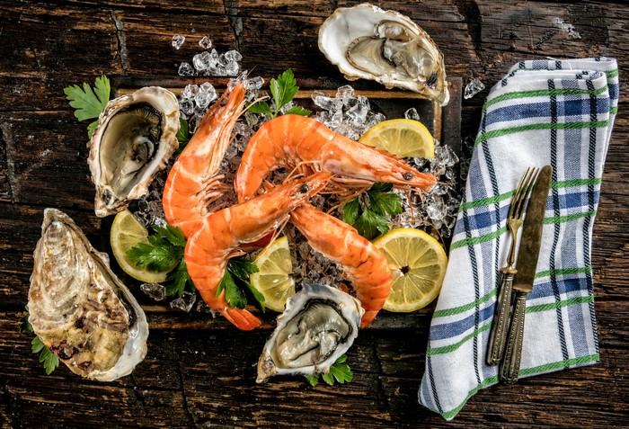 Shrimp and Oysters with Lemon and Parsley on Ice