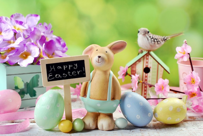 Easter bunny with eggs and flowers