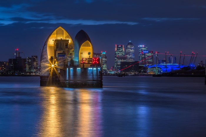 Thames Barrier and London Skyline at Night