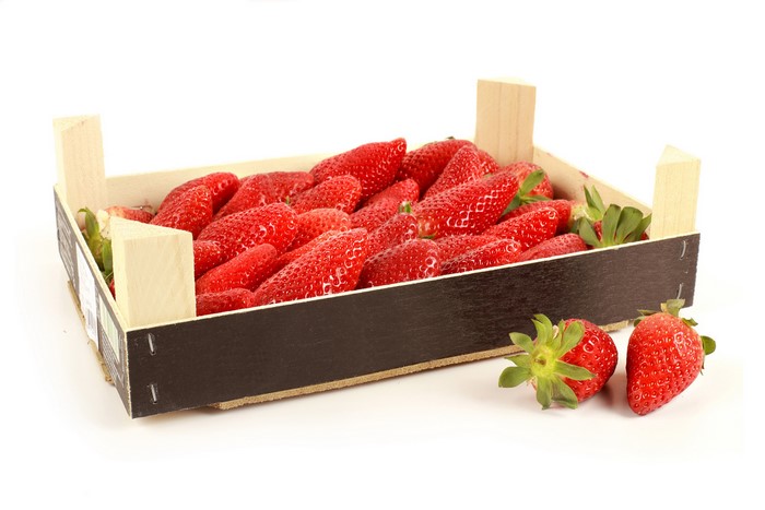 Strawberries in a wooden crate