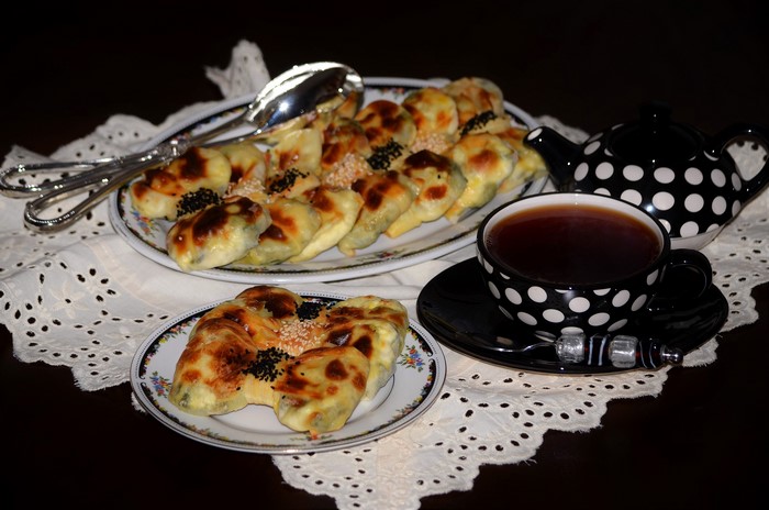 Pastries and tea set with polka dot cup and teapot