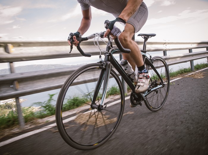 Cyclist riding a bicycle on a road