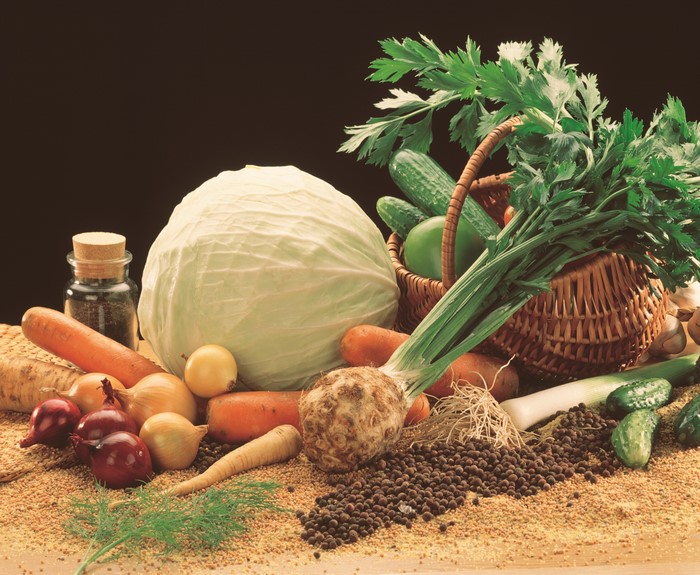 Vegetables including cabbage, onions, carrots, and celery