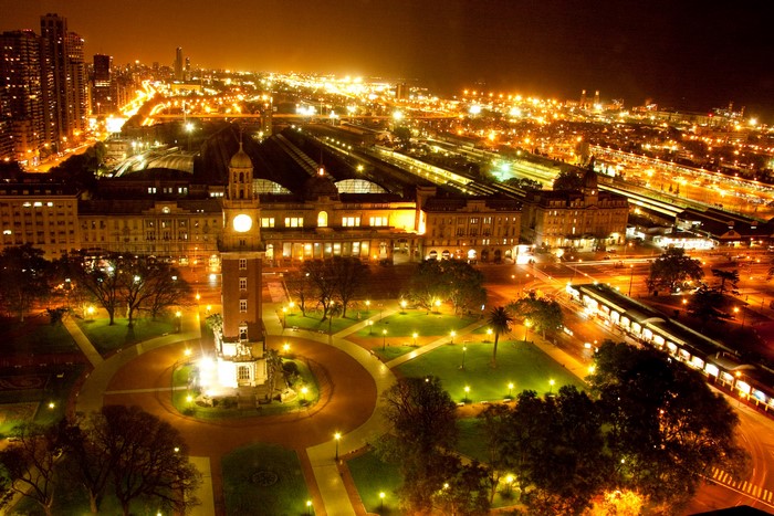 Night view of Buenos Aires with clock tower and train station