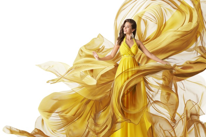 Woman in a flowing yellow dress