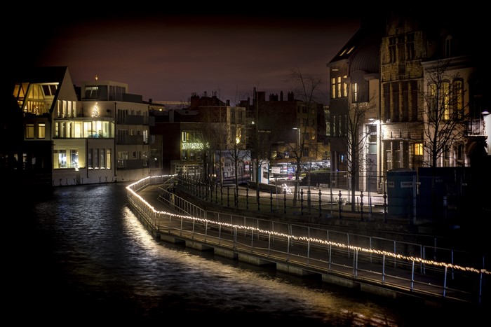 Canal and buildings at night in Mechelen, Belgium