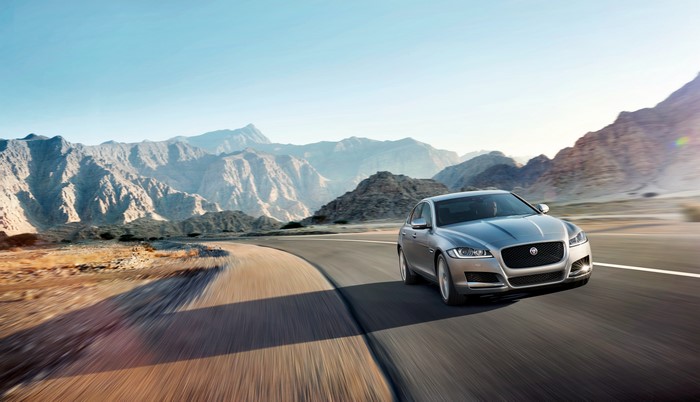 2015 XF Prestige Jaguar driving through mountains