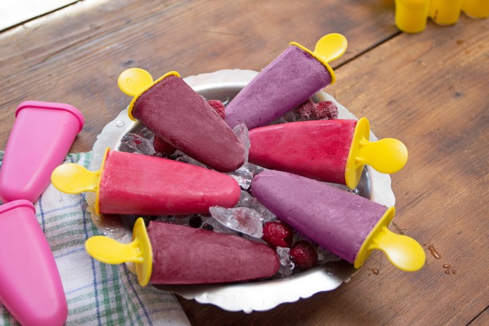 Berry popsicles on ice