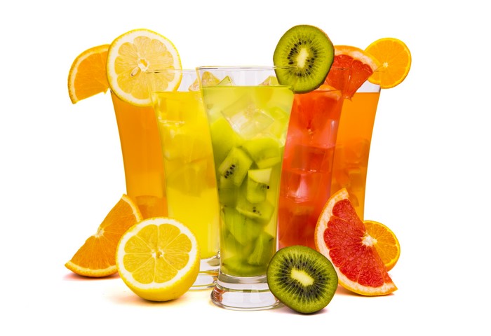 Assorted Fruit Juices in Highball Glasses with Fruit Garnish