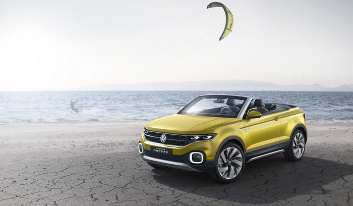 Yellow Volkswagen T-Cross Cabriolet on a Beach