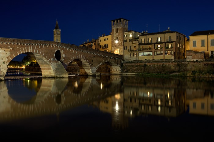 Ponte Pietra bridge in Verona, Italy at night