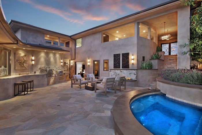 Luxury Villa Exterior with Outdoor Kitchen and Pool