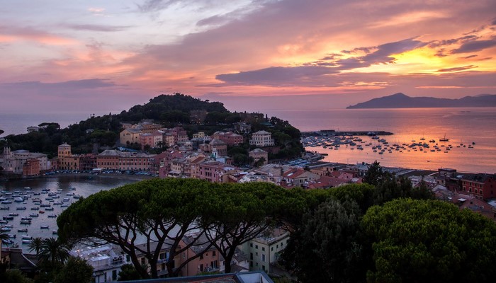 Sestri Levanti Italy coast at sunset with boats
