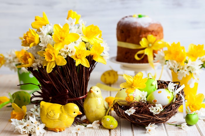 Easter still life with daffodils, chicks, and eggs