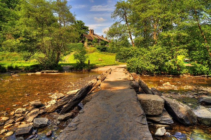 Stone bridge over stream in Exmoor National Park, UK