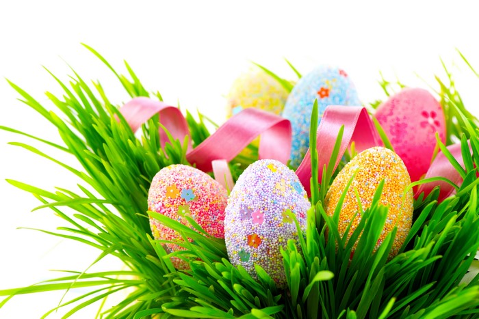 Easter Eggs in Green Grass with Pink Ribbon