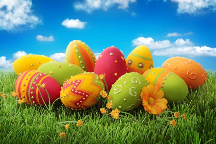 Easter Eggs on Green Grass Under Blue Sky