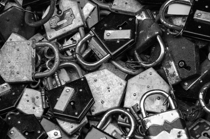 Pile of old padlocks and keys