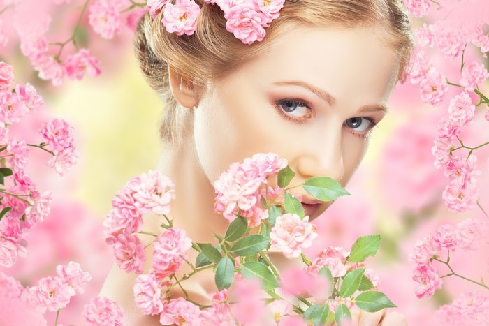 Blonde girl with roses
