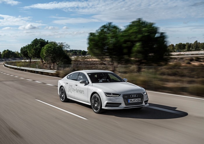 Audi A7 h-tron quattro driving on a road