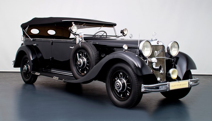 Black Mercedes-Benz convertible car from the 1930s