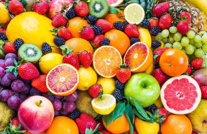 Assortment of Fresh Fruits: Strawberries, Oranges, Grapes, and More