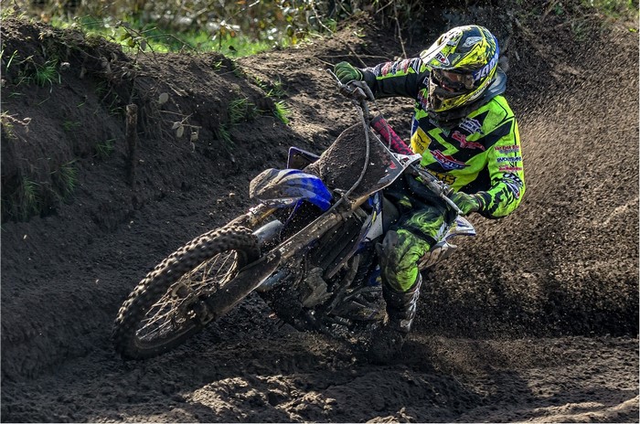 Motocross rider in mud