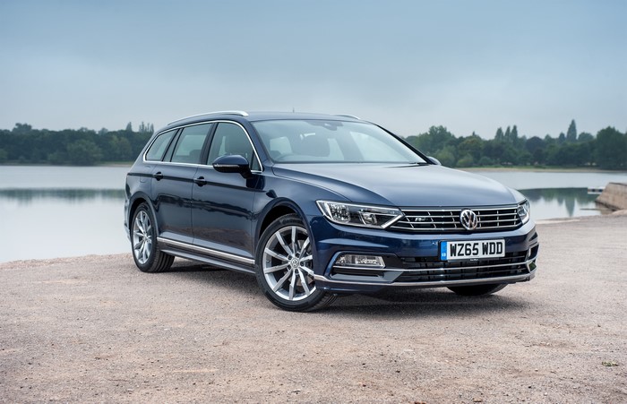 Dark Blue Volkswagen Passat Estate by a Lake