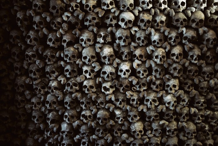 Wall of human skulls and bones