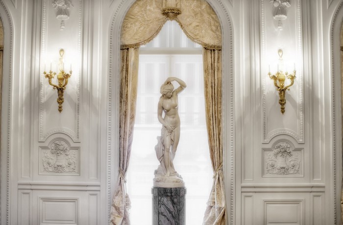 Statue in a grand room at Huntington Library