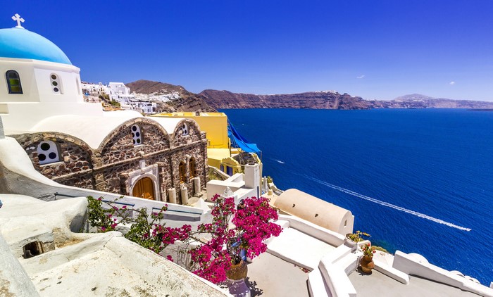 Santorini, Greece: Blue Domed Church and Aegean Sea
