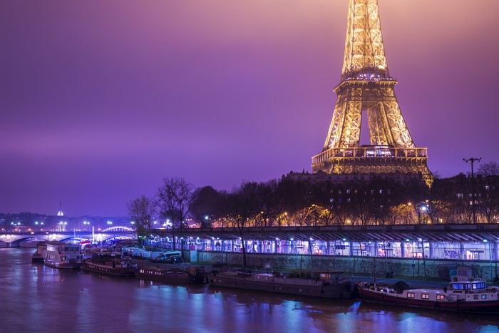 Eiffel Tower at Night over the Seine River in Paris