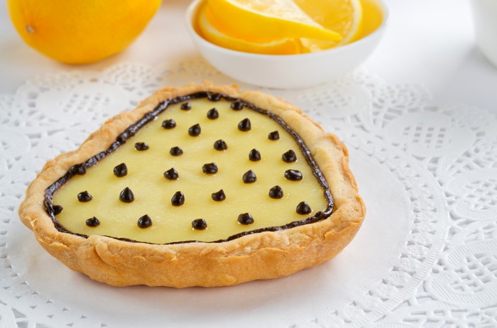 Heart-shaped lemon tart with chocolate chips
