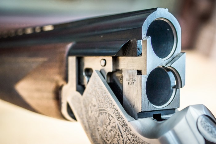 Closeup of a shotgun's barrels and receiver