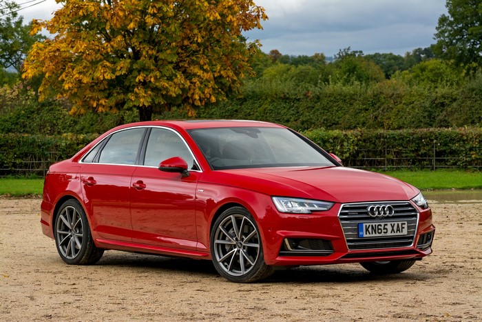 Red Audi A4 Sedan parked outdoors