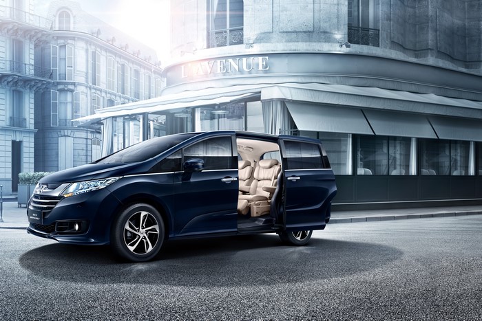 Blue 2014-2016 Honda Odyssey with open doors