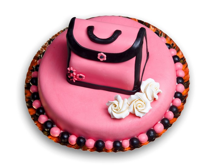 Pink cake with handbag decoration and white roses
