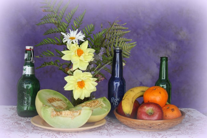 Still life with melons, bottles, and flowers