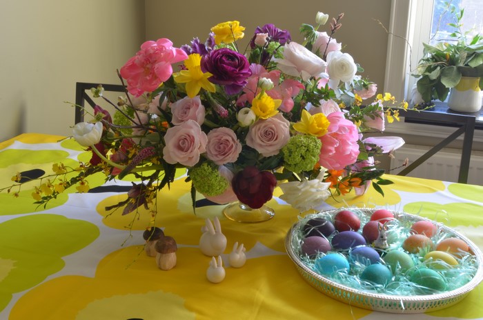 Easter Table Decoration with Flowers and Eggs