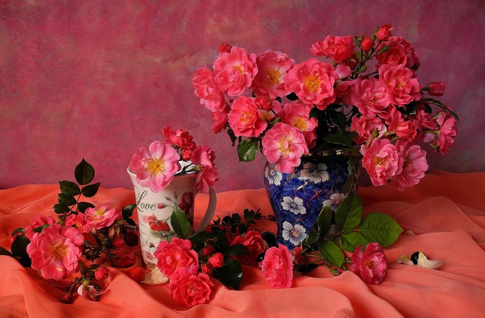 Still-life of pink roses in vases