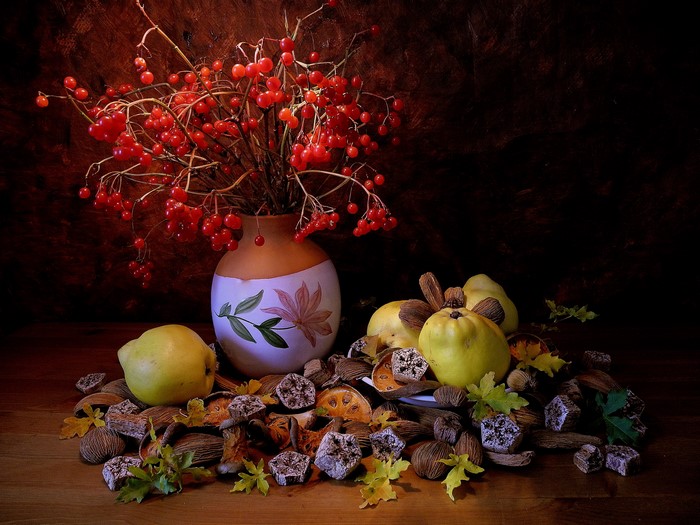 Still life with berries, quinces, nuts, and dried fruit