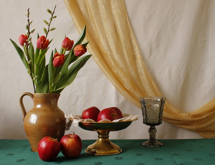 Still-life with tulips, apples, and a glass