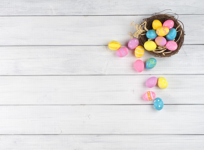 Easter Eggs in a Nest on White Wood