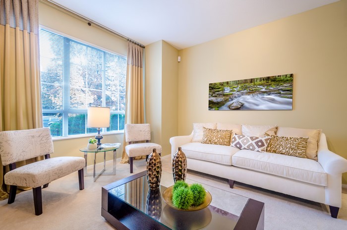 Living room with sofa and armchairs