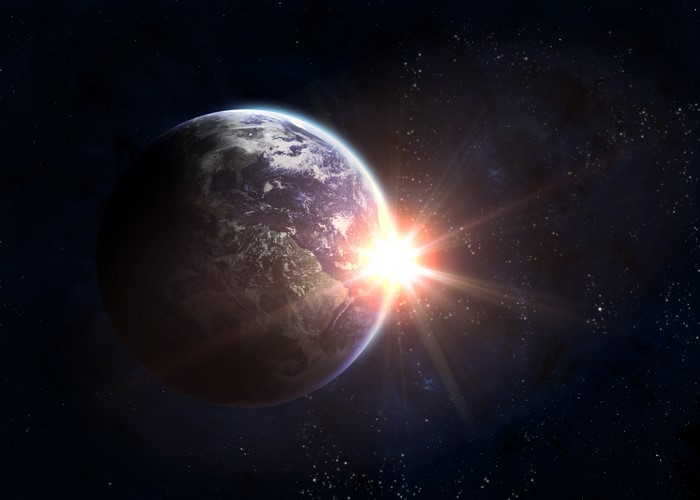 Earth with Sunrise in Space